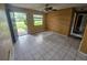Inviting living room features neutral walls and tile flooring for a clean and spacious feel at 7001 86Th N Ave, Pinellas Park, FL 33782