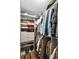 Organized walk-in closet with custom shelving, drawers, and ample storage space at 704 Lyndhurst St # 624, Dunedin, FL 34698