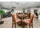 Versatile common area with dining, lounge, and exercise equipment for community enjoyment at 704 Lyndhurst St # 624, Dunedin, FL 34698