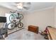 Versatile room with two bicycles hung on a rack, providing storage and functional space at 704 Lyndhurst St # 624, Dunedin, FL 34698