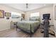 Inviting bedroom with bright windows, exercise equipment, and a decorative bedframe and bedding at 743 43Rd Ne Ave, St Petersburg, FL 33703