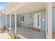 Inviting front porch with shade, cactus landscaping, and new door with mail slot at 743 43Rd Ne Ave, St Petersburg, FL 33703