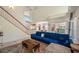 Spacious living area with a staircase, tile flooring, and natural light at 8980 Antigua Dr, Seminole, FL 33777