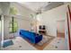 Open living room with vaulted ceilings, lots of windows and comfortable seating at 8980 Antigua Dr, Seminole, FL 33777