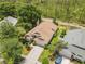 Aerial view of the home and its well-manicured landscaping at 9047 Quail Creek Dr, Tampa, FL 33647