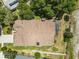 Bird's-eye view of the roof, landscaping, and privacy of this home on a lush lot at 9047 Quail Creek Dr, Tampa, FL 33647