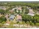 This single-Gathering home provides lush privacy with a tropical backyard and screened-in lanai at 9047 Quail Creek Dr, Tampa, FL 33647