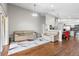Open floor plan showcasing the living room connecting to the kitchen and dining area at 9047 Quail Creek Dr, Tampa, FL 33647