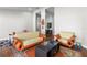 Well-lit living room with hardwood floors, stylish furniture, and an open feel, great for Gathering time at 9047 Quail Creek Dr, Tampa, FL 33647