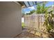 Small, fenced in outdoor patio area with stone pavers at 9047 Quail Creek Dr, Tampa, FL 33647