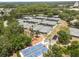 Aerial view of the tennis and pickleball courts showcasing the community's recreational facilities and surrounding greenery at 9047 Quail Creek Dr, Tampa, FL 33647