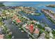 Stunning aerial shot of the community's waterfront homes and canal access at 920 Symphony Isles Blvd, Apollo Beach, FL 33572