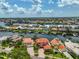 Stunning aerial view of waterfront homes, showcasing boat docks and beautiful waterways in a desirable residential neighborhood at 920 Symphony Isles Blvd, Apollo Beach, FL 33572