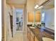 Bathroom featuring granite countertop, vanity, and a bath/shower combination at 920 Symphony Isles Blvd, Apollo Beach, FL 33572