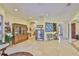 This expansive living room has lots of space for décor and storage, and has easy access to the stairs at 920 Symphony Isles Blvd, Apollo Beach, FL 33572