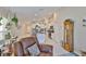 Open floor plan showing living room adjacent to kitchen, with comfortable seating at 9423 Lemon Drop Loop, Sun City Center, FL 33573
