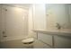 Well-lit bathroom with a tub, shower, and vanity with white subway tile at 9512 Summers Cay Cir, Thonotosassa, FL 33592
