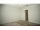 Bright bedroom featuring neutral carpet, white walls, and a ceiling fan at 9512 Summers Cay Cir, Thonotosassa, FL 33592
