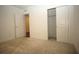 Bedroom featuring carpet, and a closet with double doors at 9512 Summers Cay Cir, Thonotosassa, FL 33592