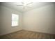 Neutral bedroom with a ceiling fan, carpet, and a window providing natural light at 9512 Summers Cay Cir, Thonotosassa, FL 33592