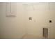 Clean laundry room with tile flooring, washer/dryer hookups and storage at 9512 Summers Cay Cir, Thonotosassa, FL 33592