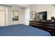 Cozy bedroom with a large television and ample closet space at 9700 Starkey Rd # 325, Seminole, FL 33777