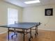 A game room featuring a ping pong table, wood floors, and a dart board at 9700 Starkey Rd # 325, Seminole, FL 33777