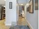 Bright hallway with tile flooring and closet storage at 9700 Starkey Rd # 325, Seminole, FL 33777