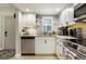Modern kitchen featuring stainless steel appliances and granite countertops at 9700 Starkey Rd # 325, Seminole, FL 33777