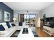 Open floorplan featuring a spacious living room with access to an outdoor seating area at 9700 Starkey Rd # 325, Seminole, FL 33777