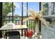 Bright patio area with a view of the pool and common areas at 9700 Starkey Rd # 325, Seminole, FL 33777