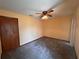 Bedroom with plain carpet flooring, light walls, and neutral ceiling at 11394 Collingswood St, Spring Hill, FL 34608