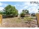 Backyard featuring a fire pit and a partial view of the home at 11988 117Th St, Seminole, FL 33778