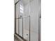 Modern bathroom featuring a glass-enclosed shower with white subway tile surround at 1203 E New Orleans Ave, Tampa, FL 33603