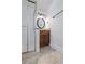 Bathroom featuring a glass shower, stone vanity top, and dark wood vanity at 1203 E New Orleans Ave, Tampa, FL 33603