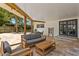 Spacious covered patio with outdoor seating at 125 Live Oak Ln, Largo, FL 33770