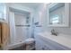 Updated bathroom with a shower and a modern vanity at 12873 Cumberland Dr, Largo, FL 33773