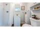Bathroom featuring a shower, vanity, and toilet with white fixtures at 12873 Cumberland Dr, Largo, FL 33773