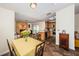 Inviting dining area boasts a view of the kitchen and the fireplace, as well as access to the patio at 12873 Cumberland Dr, Largo, FL 33773