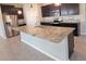 Kitchen featuring granite countertops, stainless steel appliances and center island at 13111 Pepper Stem St, Spring Hill, FL 34609