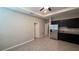 Spacious area with modern stainless steel appliances and tile flooring at 13111 Pepper Stem St, Spring Hill, FL 34609