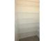 Pantry with ample metal shelving at 13111 Pepper Stem St, Spring Hill, FL 34609