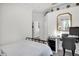Comfortable guest bedroom with streaming TV and adjacent desk space at 13336 Graham Yarden Dr, Riverview, FL 33579