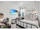 Bright guest bedroom with streaming TV and bright window at 13336 Graham Yarden Dr, Riverview, FL 33579