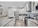 Well-equipped kitchen with stainless steel appliances, granite counters, and ample storage at 13336 Graham Yarden Dr, Riverview, FL 33579