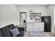 Compact kitchenette area featuring modern appliances and ample storage, ideal for efficiency at 13336 Graham Yarden Dr, Riverview, FL 33579