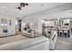 Open-concept living room flowing into a modern kitchen with a large island at 13336 Graham Yarden Dr, Riverview, FL 33579
