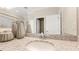 Bathroom view highlighting a white sink with granite countertop and neutral decor at 15107 Oxford Grey Dr, Bradenton, FL 34211
