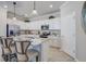 Well-equipped kitchen with stainless steel appliances, granite countertops, and ample cabinet space at 15135 Oxford Grey Dr, Bradenton, FL 34211