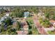 Aerial shot showing location relative to other homes in a neatly planned development at 1794 Santa Barbara Dr, Dunedin, FL 34698